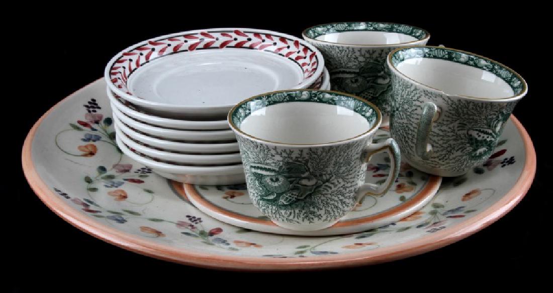 VINTAGE AND ANTIQUE CHINA MIXED SET OF 11 PIECES: 11 pieces of vintage and antique china dinnerware, seeming to come from three separate sets. Includes 3 teacups, one of which has a chip on the rim, six 6 inch plates, a 7 inch platter, and a 14 inch