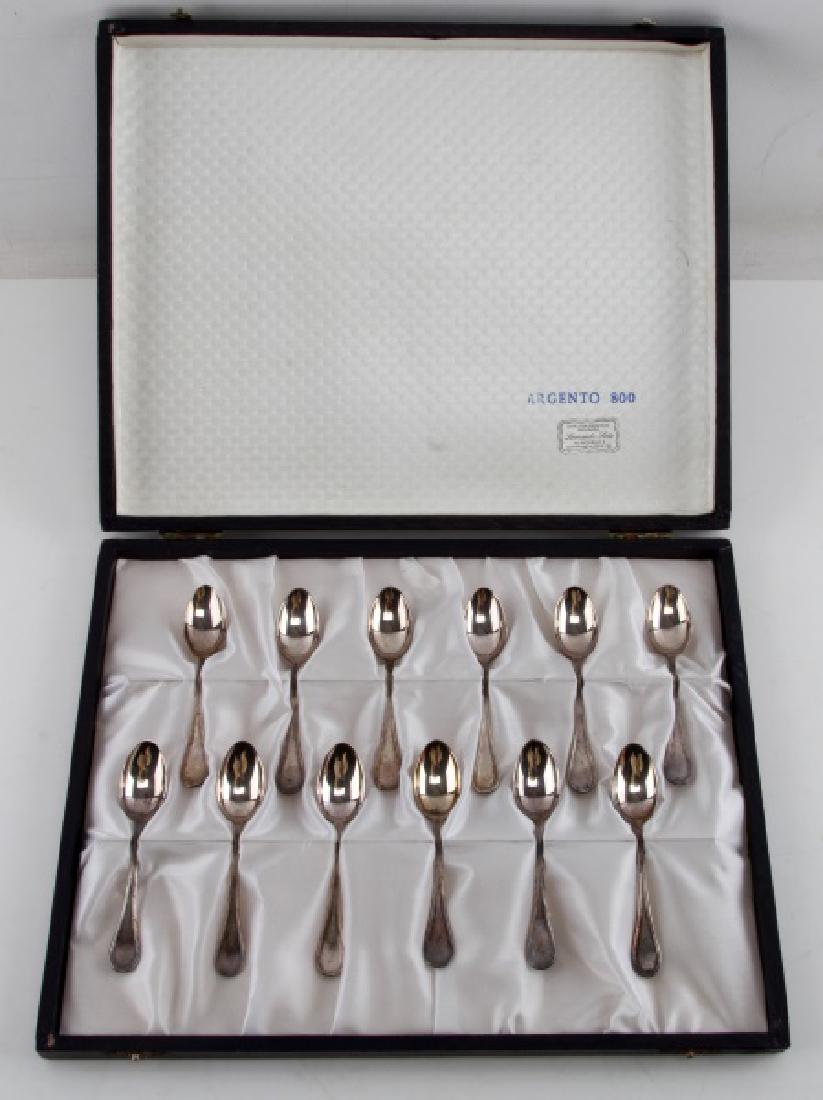 STERLING SILVER DEMITASSE SPOONS WITH CASE: Set of 12 Silver Demitasse Spoons 800/1000 Silver. In original Argento 800 case with label. Case is in good condition with minor abrasions at the corners of box. Spoons are 4" long lightly tarnished. 
