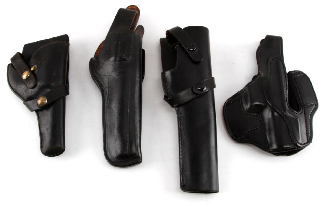 PISTOL AND REVOLVER BLACK LEATHER HOLSTER LOT OF 4: First is marked 'Don Hume H726 No.41'. Second is marked 'Brauer Bros. MFG. Co. H33'. The third is marked 'Moose Brand Sporting Goods H19'. The last's maker mark is unreadable, but it is marked 'BB46'.