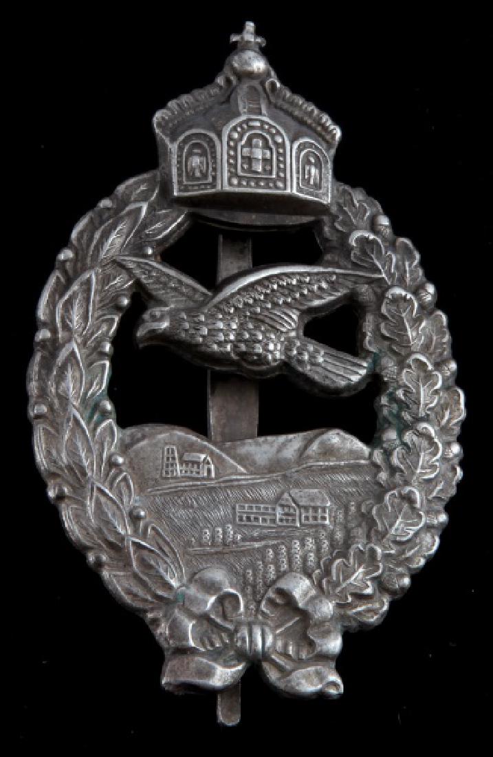 WWI IMPERIAL PRUSSIAN RETIRED PILOTS BADGE: 1920's type with long flat pin. Worn by pilots who were no longer active flying, Whether due to retirement or injuries. This lot has a reserve.