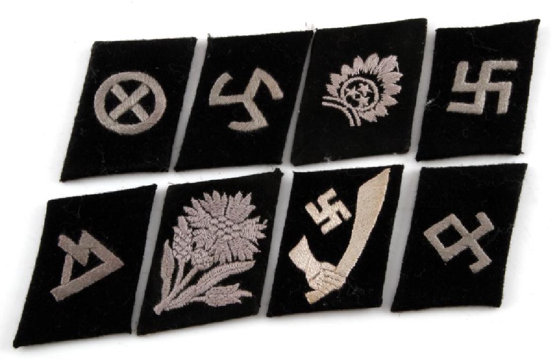 LOT OF 8 OBSCURE GERMAN WWII SS COLLAR TABS: Lot of 8 obscure German WWII SS collar tabs. Includes 18th Freiwilligen Division, 13th Mountain Division. 22nd Freiwilligen Cavalry, 7 Freiwilligen Gebrigs Division, 13th Waffen Grenadier Division, 15