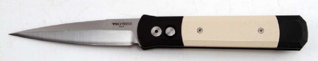 PROTECH GODFATHER AUTOMATIC KNIFE MICARTA TUXEDO: Tuxedo, black handle with anodized aluminum frame and cream Micarta inlay, The hardware is satin finished and the tip-up carry pocket clip is black. Satin finished 154-CM steel blade, overall length:9