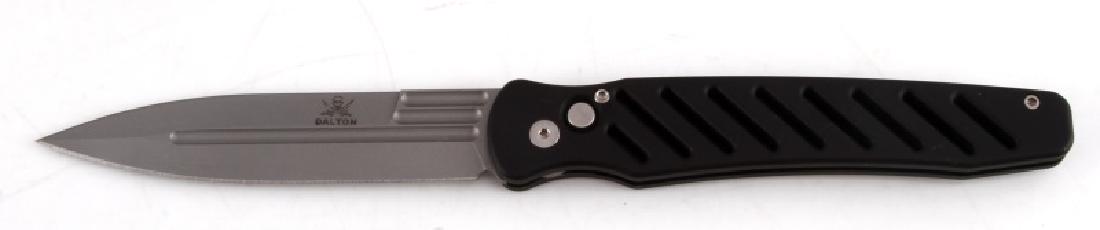 ROB DALTON XL BATTLE BONES AUTOMATIC KNIFE: XL Bones automatic from Rob Dalton has a bead blast blade and black slotted aluminum frame. Bead blast titanium clip. Strong and fast coil-spring opening. It is a tip up carry style with a drop spear 