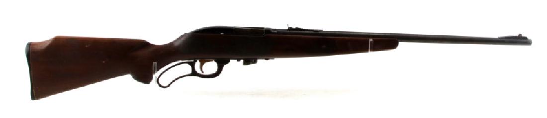 MARLIN FIREARMS MODEL 56-22 CAL LEVER ACTION RIFLE: A Marlin Firearms Co. Model 56-22 lever action rifle Includes detachable magazine. In good condition with minor wear on the stock and some surface corrosion. Bore is bright and clear. Barrel measures 
