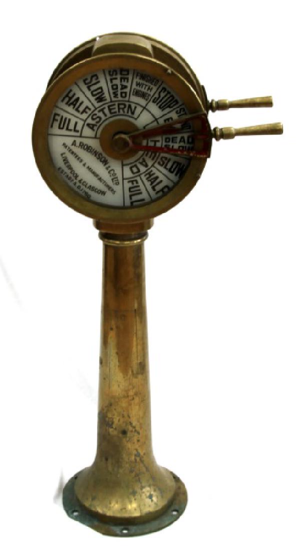 VINTAGE ROBINSON BRASS SHIP BRIDGE TELEGRAPH: A brass ship's bridge telegraph made by A Robinson & Co. Ltd. One face, which is in very good condition, as are internal mechanism. One crystal face has a crack running up the middle, and there is a 2