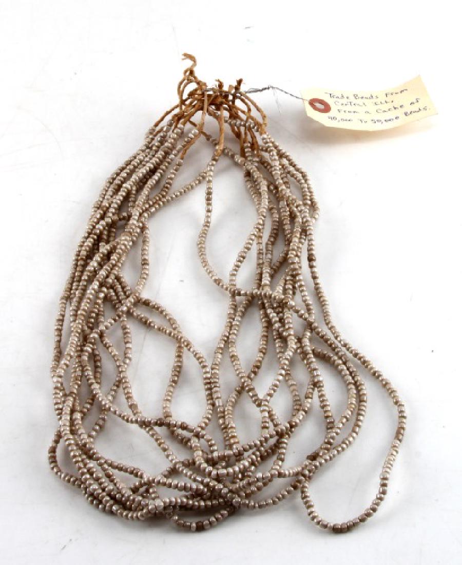 NATIVE AMERICAN CENTRAL ILLINOIS TRADE BEAD LOT: Lot contains ten strands of pearlescent beads claimed to have come from a collection of beads from Central Illinois. Very good condition.