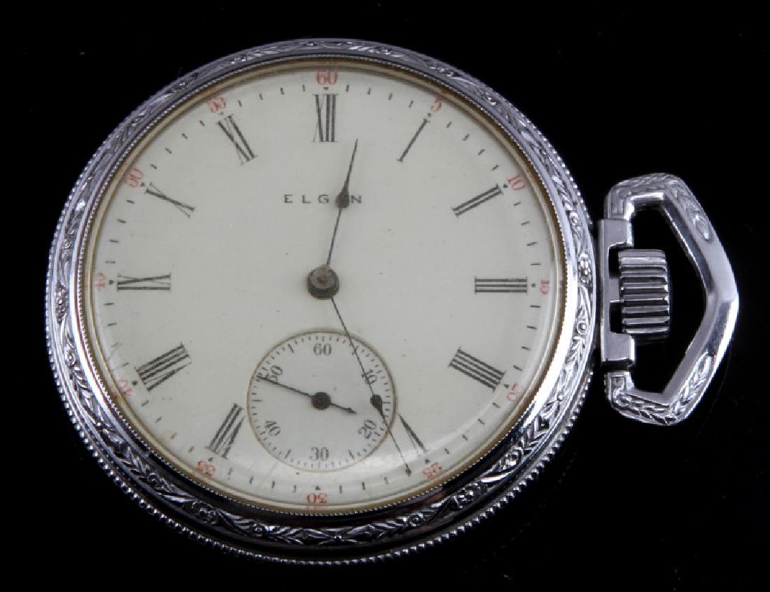 VINTAGE OPEN FACE ELGIN POCKET WATCH: Elgin National Watch Co. 15005089, 15 jewel, open faced with decorative silver tone Defiance case # 6773887. Movement will start but watch is in need of servicing.