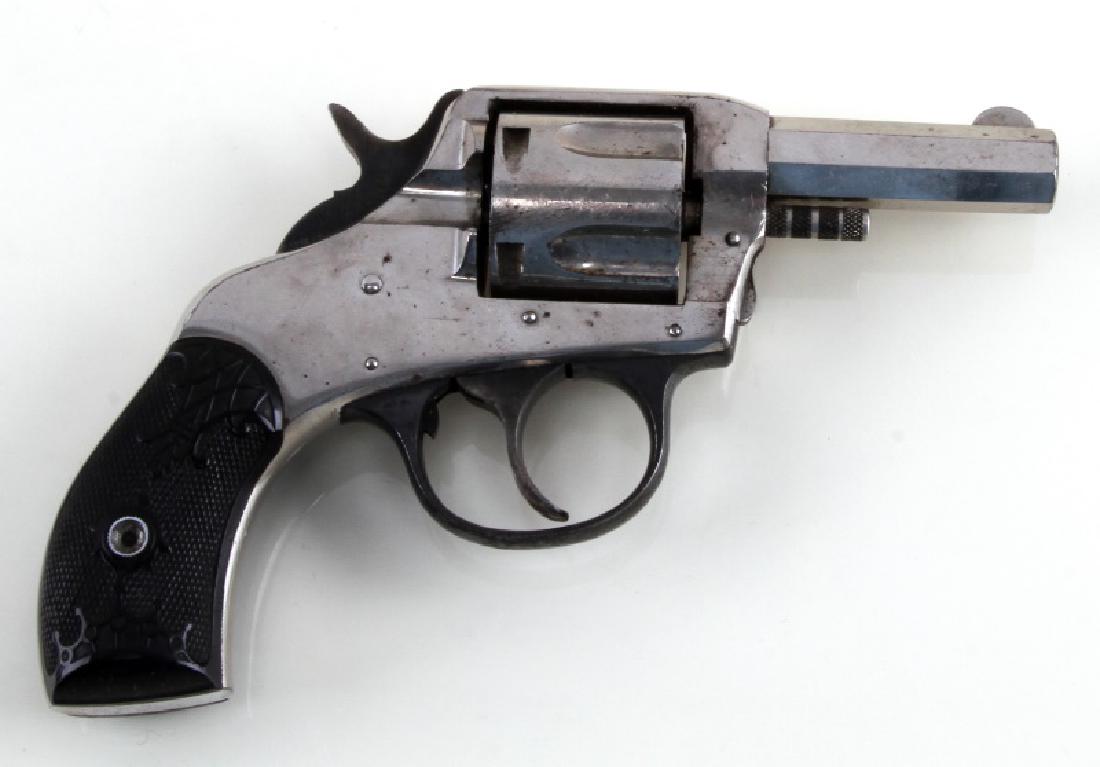 H&R ARMS DOUBLE ACTION .38 REVOLVER: H&R .38 caliber 5 shot revolver with nickel finish. There is some tarnish on the outside of the revolver. Barrel measures 2 1/2 inches with dark pitted bore. Overall good condition. Requires FFL or C&