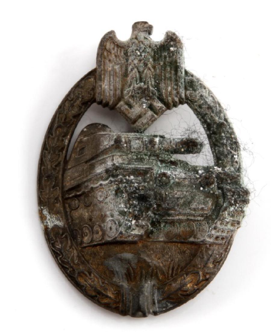 GERMAN WWII THIRD REICH PANZER ASSAULT BADGE: German WWII Panzer Assault Badge. Heavy oxidation. "C" hook broken off. Unmarked reverse features a thin vertical back pin. Overall G condition.