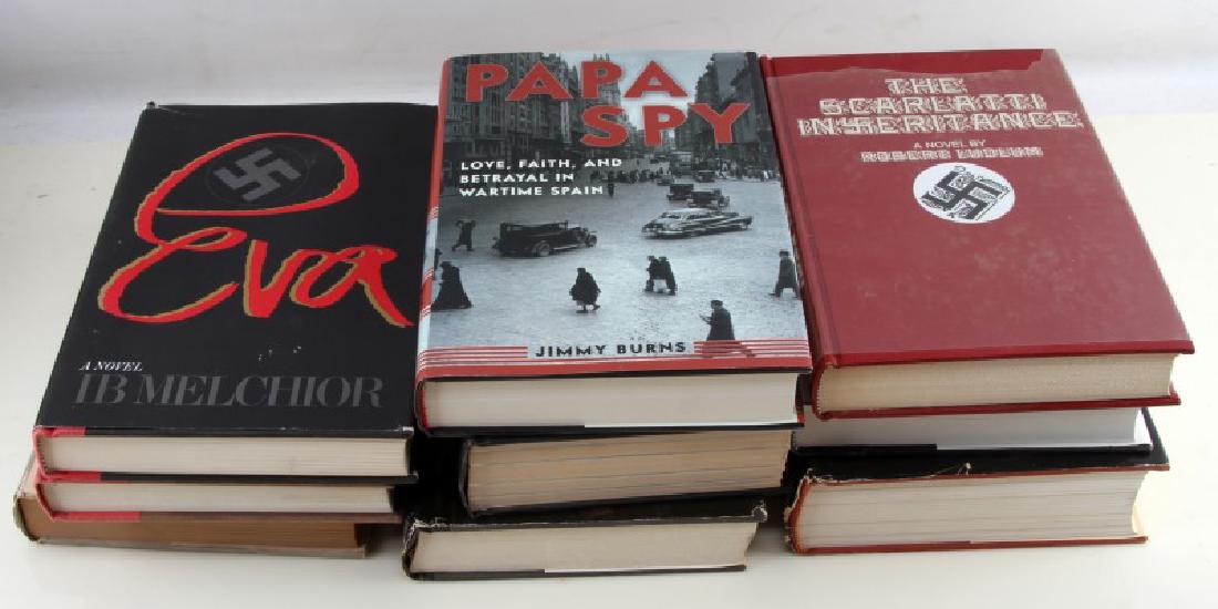 LOT OF 9 VINTAGE RARE BOOKS ON GERMAN THIRD REICH: Grouping of 9 vintage rare, scarce, and uncommon military books on the subject of the WWII era German Third Reich titles include: Papa Spy by Jimmy Burns, The Scarlatti Inheritance by Robert Ludlum, E