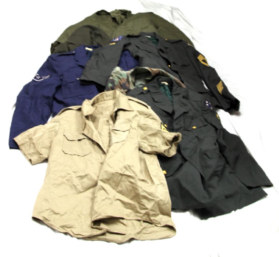 US WWII AND COLD WAR UNIFORM CLOTHING MIXED LOT: Lot contains different uniform pieces from WWII and the early Cold War. Includes Air Force NCO Class A uniform jacket and pants, size 40R, as well as a WWII US Army NCO tropical uniform shirt, as well