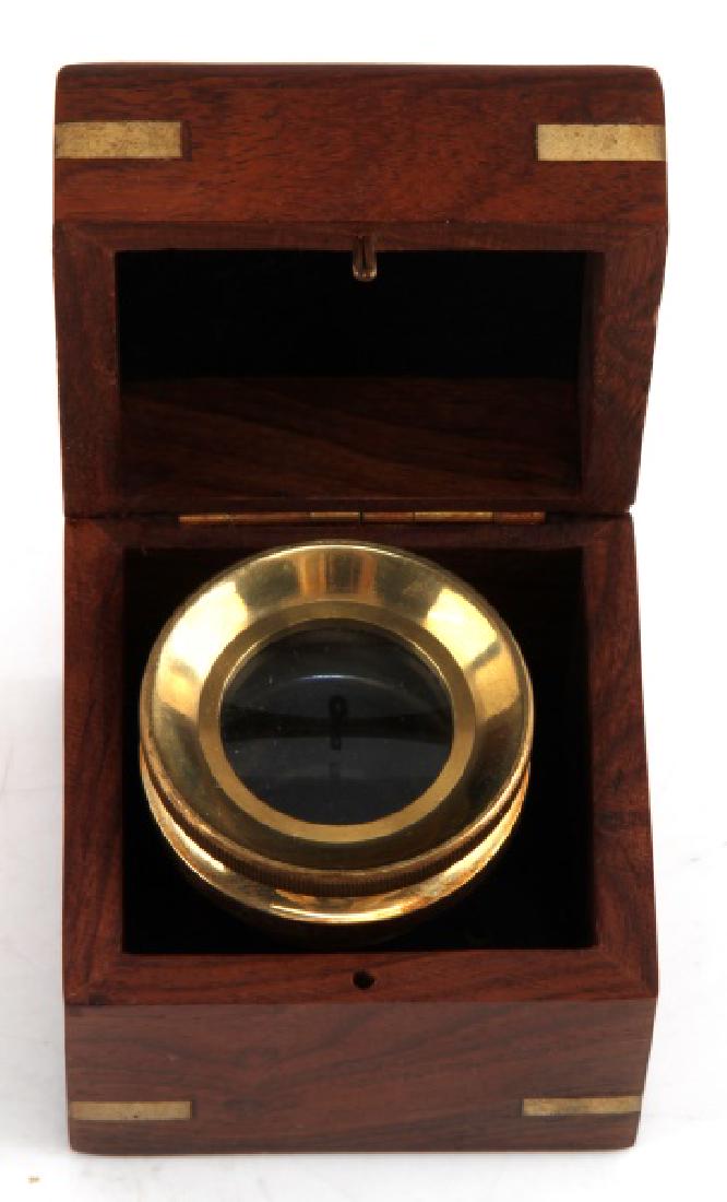 ANTIQUE NAVIGATOR BRASS TRIPOD CHART MAGNIFIER: Brass chart magnifier in fine wooden box. Magnifier measures 2 inches in height by 1 3/4 inches in width, in a box measuring roughly 3 inches cube. In very good condition.