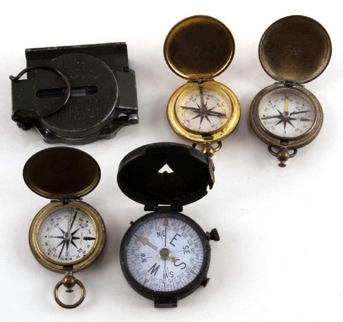 WWII U.S. ARMY MILITARY COMPASS LOT OF 5: All point north on of the smaller round pocket compass has broken glass.