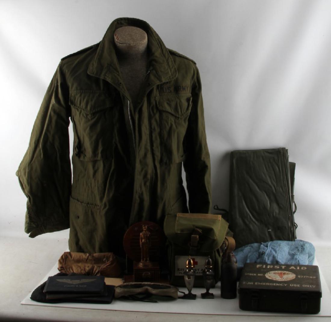 US MILITARY MIXED LOT AXE FIRST AID ARMY NAVY: Mixed lot contains: Army field jacket size small, Navy shirt with "Spence" to pocket, two pick axes with sheathes, nylon utility bag, two first aid kits, two inert grenades, salt and pepper shaker (J.