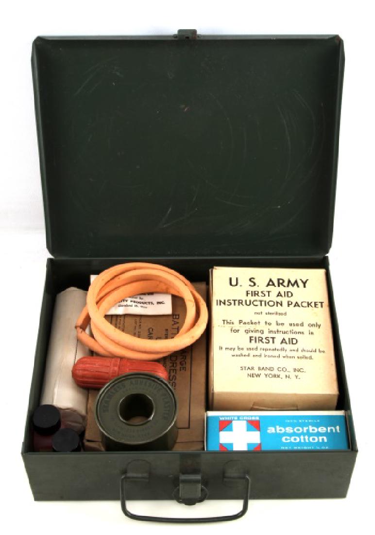 VIETNAM ERA US ARMY MEDICAL FIRST AID KIT: Comes in OD green metal box. Kit includes bandages, Mercurochrome, snake kit, rubber tubing and ammonia inhalants.