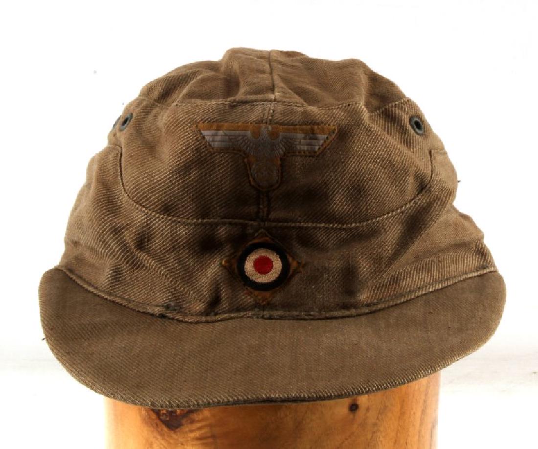 WWII GERMAN THIRD REICH M43 AFRIKA OR TROPICAL HAT: Has tropical type eagle and resette. Shows wear and correct construction for this style hat. Unauthenticated sold as is This lot has a reserve.