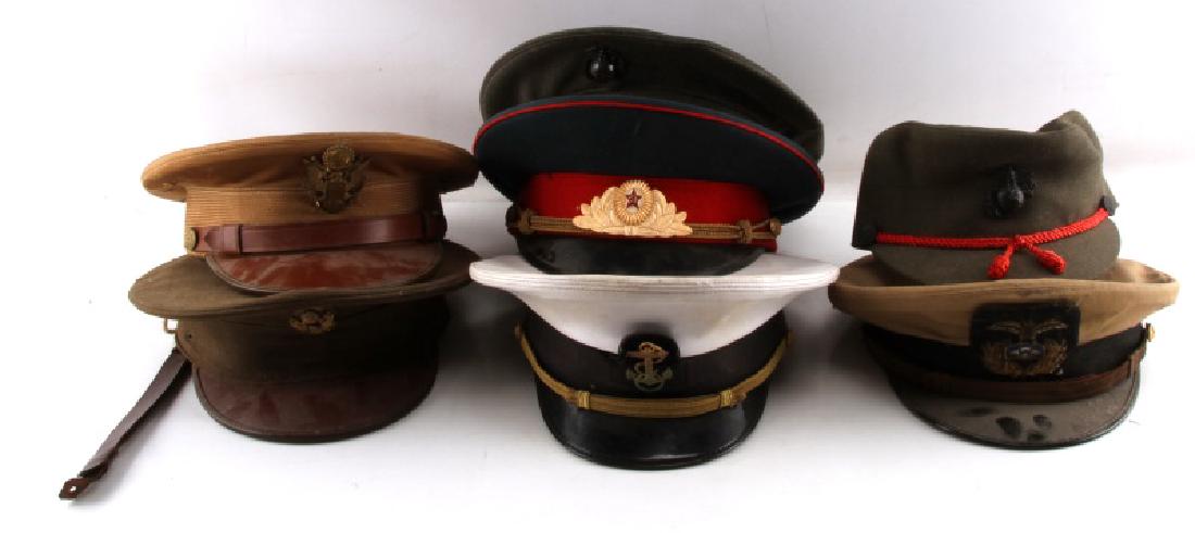 LOT OF 7 HATS VISORS US ARMY MARINE RUSSIAN MORE: Lot includes: two Army dress visors, one white Navy, green wool with EGA pin, Marine Merchant visor with bullion insignia, Russian Infantry, and one women's Marine officer cap with red rope. Fair to v