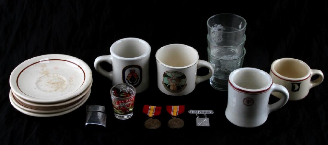 US ARMY NAVY DINNERWARE MEDAL AND ZIPPO LOT: Lot contains several pieces of vintage US Army dinnerware, some US Navy glassware, three US Army medals, and a Zippo-style lighter from Streamliter with the 101st Division emblem on it. Includes four 