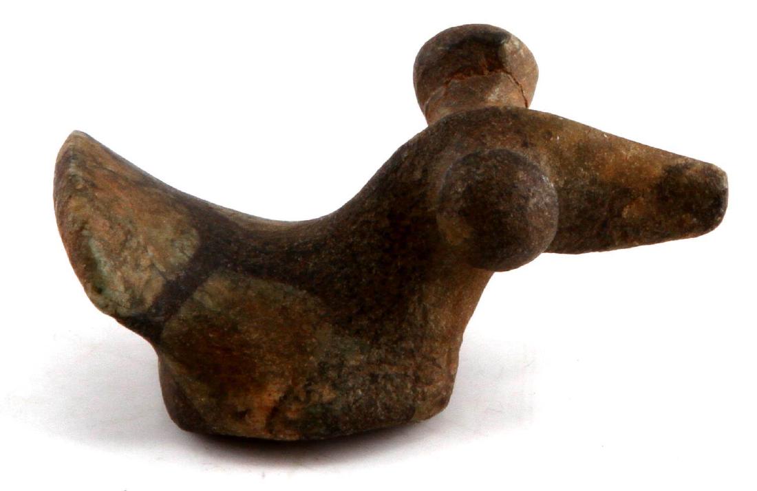 NATIVE AMERICAN CARVED POPEYE BIRDSTONE: Popeye birdstone statuette. Measures 3 inches long. Has a pair of holes cut in the base connected to the front and back. In excellent condition.