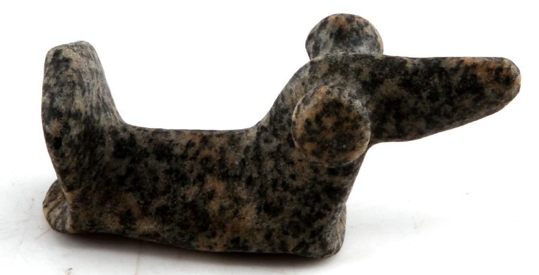NATIVE AMERICAN CARVED POPEYE BIRDSTONE: Popeye birdstone statuette. Measures 4 inches long. Has a pair of holes cut in the base connected to the front and back. In excellent condition.