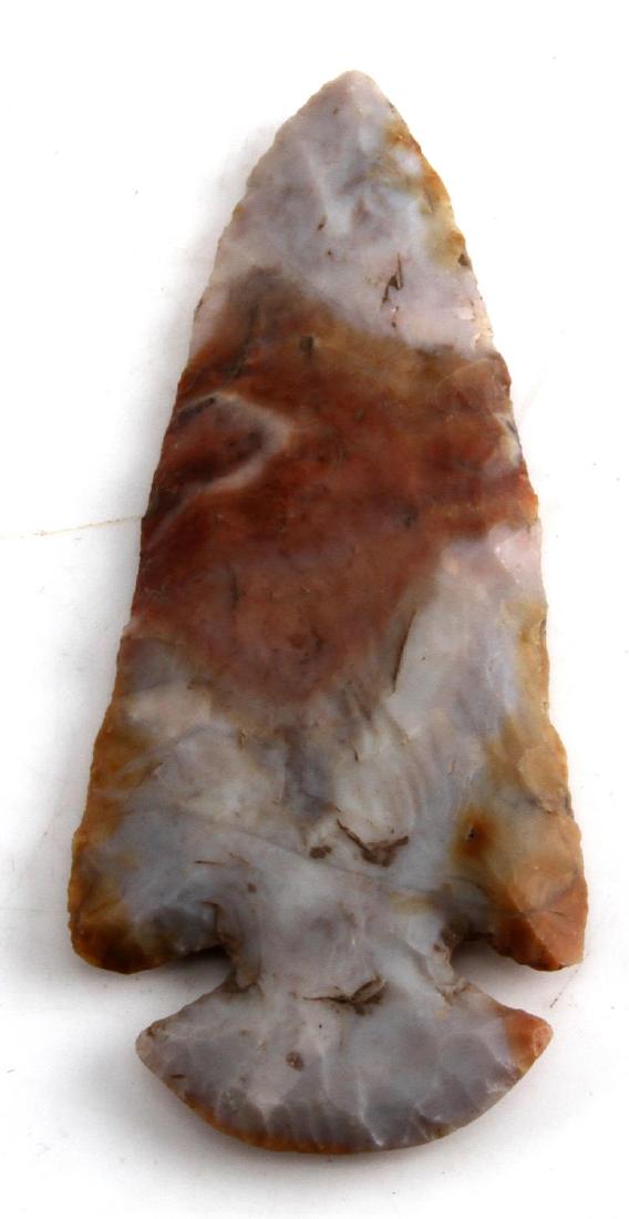 4 1/4 INCH LONG MULTI COLOR DOVE TAIL ARROW POINT: Flint Ridge Multi- Colored Dovetail Arrow Point found in Licking County, Ohio, This Arrow point is multi-colored and bears a dovetailed back for fastening. The general size of the arrow point is consi