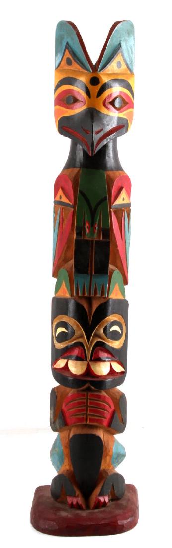 NORTHWEST NATIVE INDIAN TLINGIT HAIDA TOTEM POLE: Hand carved polychrome totem, in very good condition, measuring 25 inches in height.
