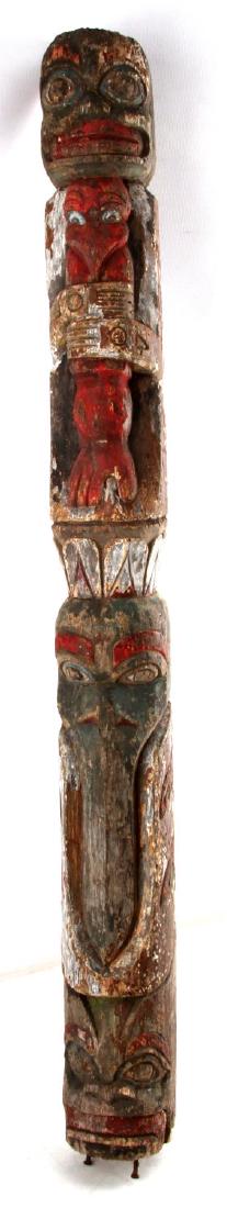HAND CARVED PAINTED NATIVE AMERICAN WOODEN TOTEM: "PUTU ADI" is carved on the back of the totem pole. The totem pole has some wood loss from weathering and considerable paint wear. Possible Clan Memorial marker. Missing base with 3 rusty nails extend