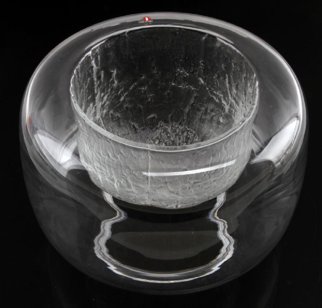 FINLANDIA TIMO SARPANEVA SCANDINAVIAN ART GLASS: Finlandia series in production 1969-74. Blown in a wooden mould, center pressed inwards. Diameter 25cm with a height of 17cm. Label on rim intact, signed on bottom Timo Sarpaneva 3375. No apparent chi