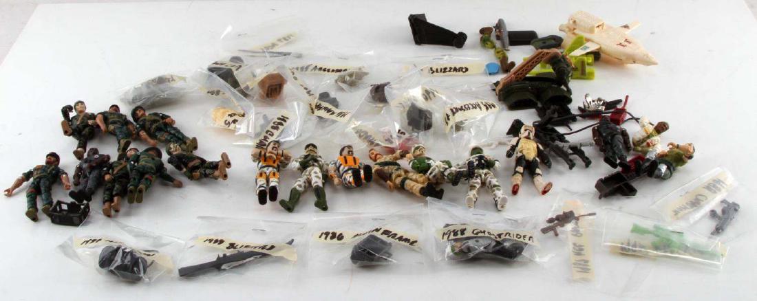 HUGE LOT OF VINTAGE G.I JOE FIGURES & ACCESSORIES: Huge lot of vintage G.I Joe figures toys and accessories including but not limited to : 1988 Ghost Rider, 1988 Blizzard, 1986 Main Frame, 1990 AM Bus, 1988 Charbroil, 1987 Ace #5 rifle, 1988 blizzard 
