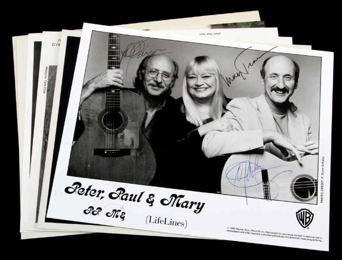VARIOUS MUSICAL ARTIST AUTOGRAPH PHOTO LOT OF 7: All are in very good condition. Autographs inclue Garth Brooks, Willie Nelson, LeAnne Rimes Billy Ray Cyrus, Peter Paul and Mary.