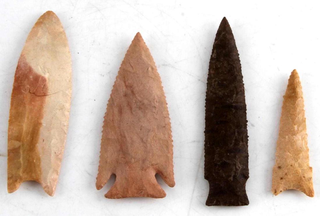LOT OF 4 ASSORTED ARCHAIC TO NEOLITHIC ARROWHEAD: Lot of 4 individually richer mounted Neolithic to Archaic arrow point some of which are fluted, Clovis and Dalton points. All items are in good condition with no signs of damage beyond expected aging.