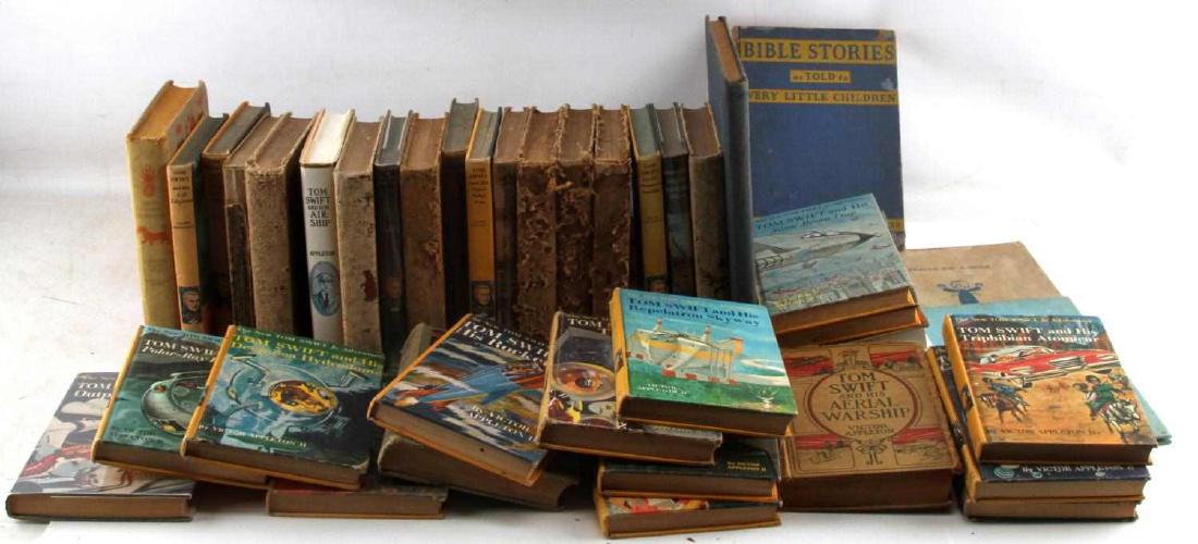 ANTIQUE AND VINTAGE CHILD BOOK LOT TOM SWIFT: Lot of antique children's books. Mostly Tom Swift books, both the original run such as Tom Swift and His Motor Cycle, as well as several New Tom Swift adventures. Also includes a copy of The Swiss Fam