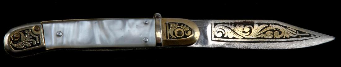 VINTAGE TOLEDO BLADE SPRING SWITCH BLADE KNIFE: Strong spring works well 3.5 inches closed 6 open.
