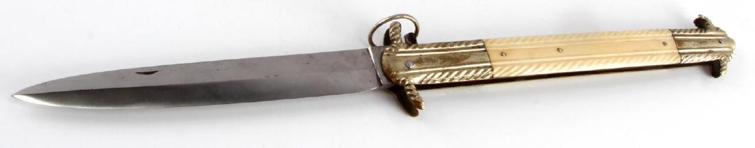 LG WALRUS TUSK GRIP FOLDING VINTAGE STILETTO KNIFE: Large walrus grip folding stiletto knife. Grips are walrus in origin and well over 100 years of age. They measure 4 30/32" x 7/8". Stainless steel blade shows little to no wear measuring in at 7". Ful