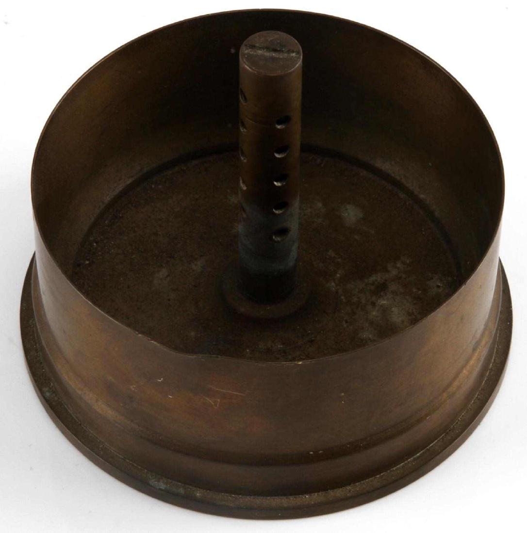 105 MM M14 TYPE 1 SHELL TRENCH ART ASH TRAY 1944: Trench Art Ash Tray marked " 105 MM M14 Type 1 1944" on the rimfire of cartridge, measures 4.5 inches in circumference and 4 inches tall. Item is in good condition for its WWII age, no corrosion beyon