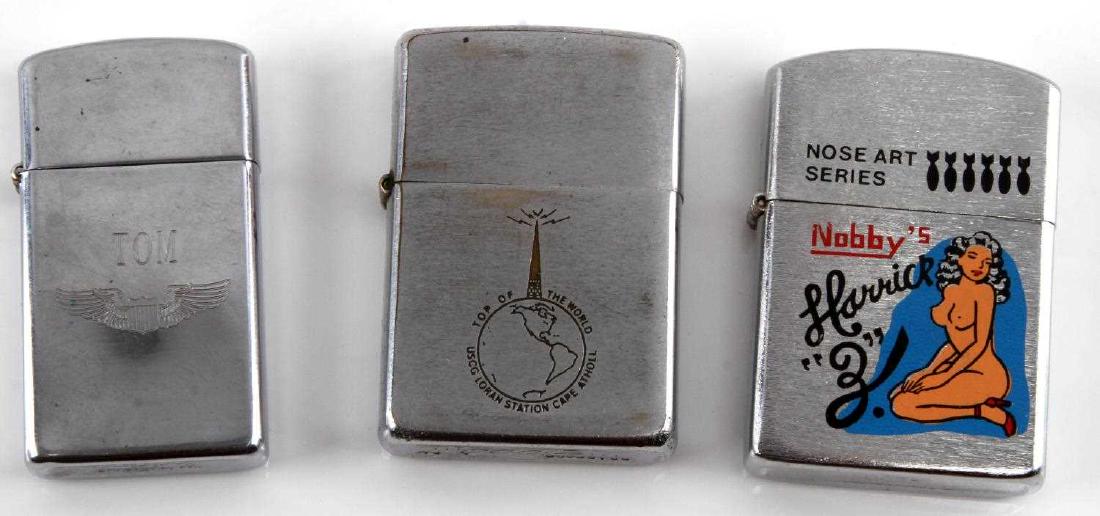 3 MILITARY ZIPPO LIGHTERS BOMBER COAST GUARD USAAF: 3 WWII Zippo lighters. Includes 1 United States Coast Guard "Top of the World USCG Loran Station Cape Atholl" (with box), one USAAF with insignia made out to "TOM", and one Bomber nose art series. All
