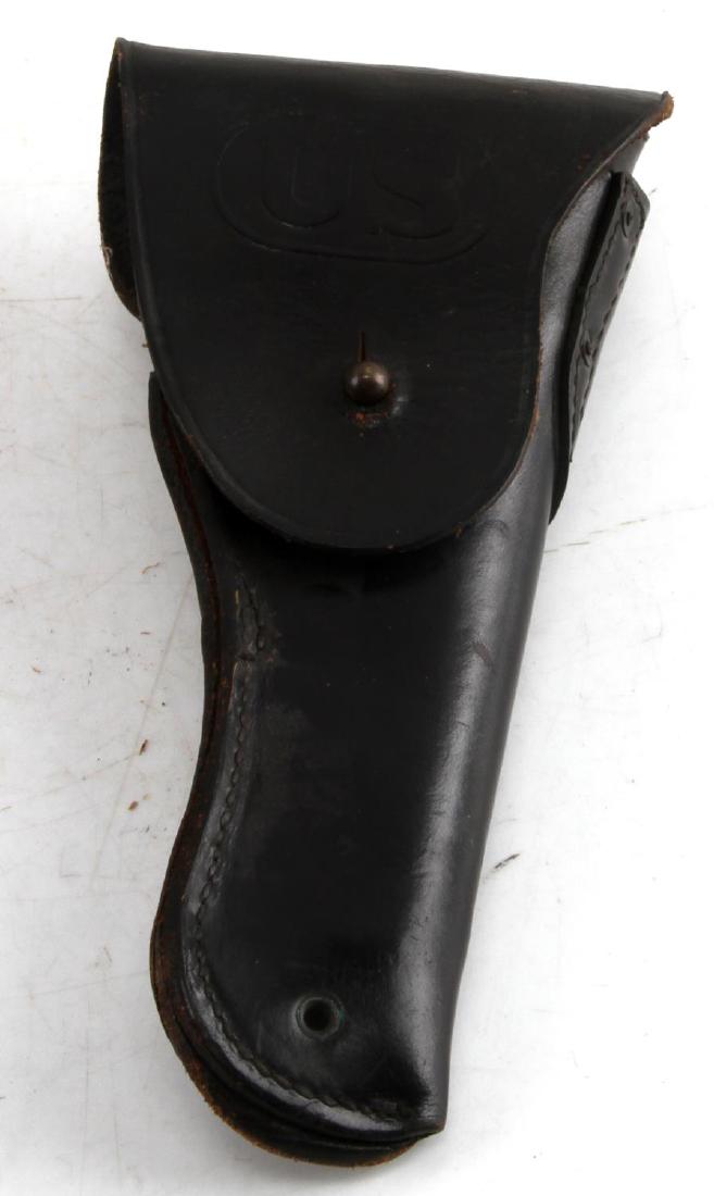 MARCH 1963 VIETNAM BUCHEIMER LEATHER COLT HOLSTER: Vietnam era US holster made by Bucheimer. Stamped on back MAR 1963 MRT. US hallmark is crisp on flap. This holster was made for colt 1911 guns. Crisp design, has very little wear.