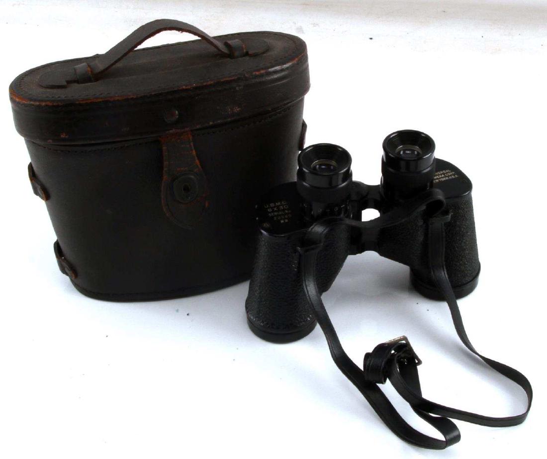 USMC WWII UNIVERSAL CAMERA CORP BINOCULARS 6X30: USMC WWII Universal Camera Corp binoculars, 6x30. Show some wear and scratching on lenses, G condition. With original hard leather case.