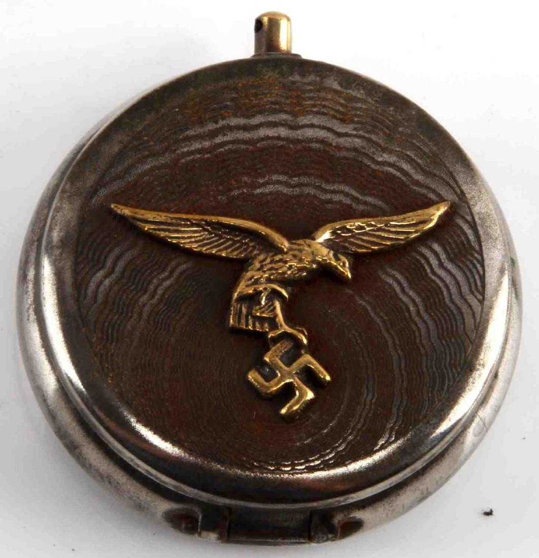 GERMAN WWII LUFTWAFFE PILOT POCKET ASHTRAY: Measures 2 inches in diameter. Maker's marks. Age wear and rust present. Unauthenticated. Sold "as is". This lot has a reserve.