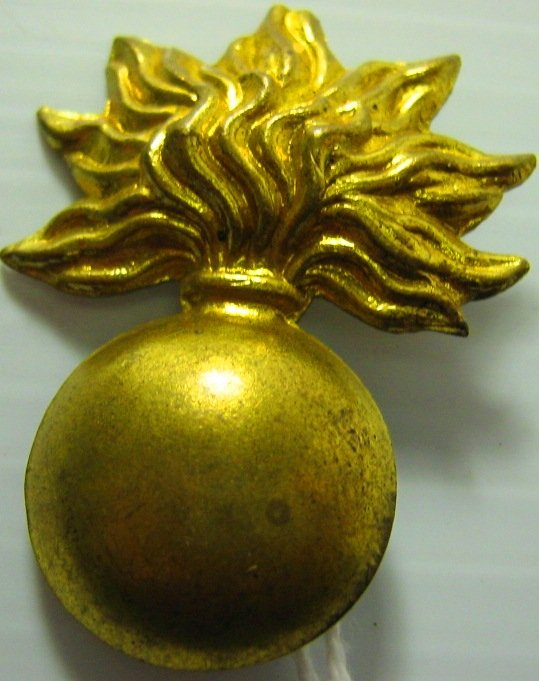 CIVIL WAR KEPI HAT FLAMING GRENADE INSIGNIA: Ordinance Kepi Hat Insignia, Flaming Grenade, Civil War. Gold in color retains it's original shape and color, loops of back are still in tact 1 1/2".