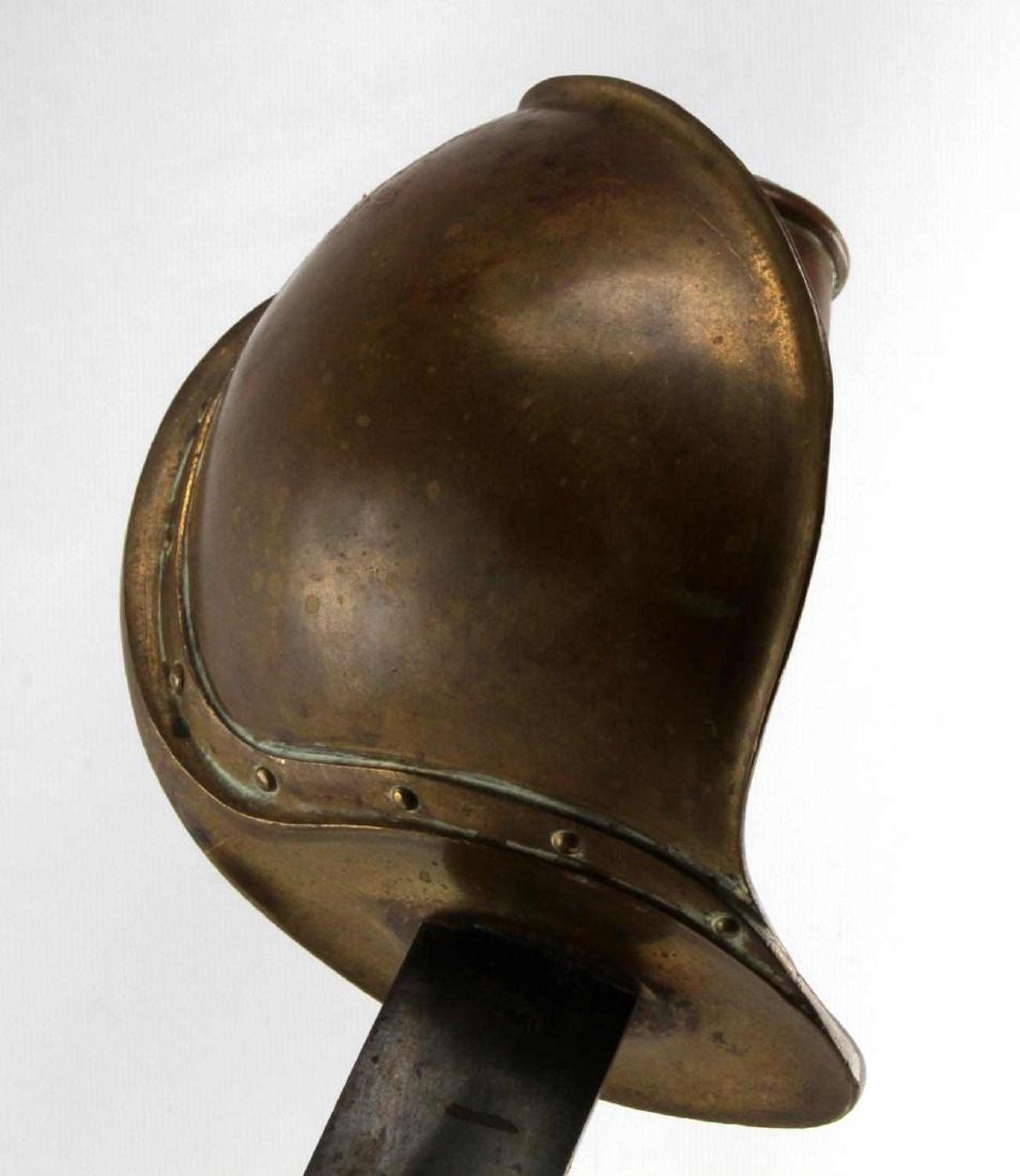 US CIVIL WAR 1860 NAVAL CUTLASS SWORD: Ricasso reads 1862 AMES MFc Co. Chicopee Mass. There is scattered surface oxidation throughout but blade retains some bluish tone, brass guard rack number "12M 690", guard is in very good condition wi