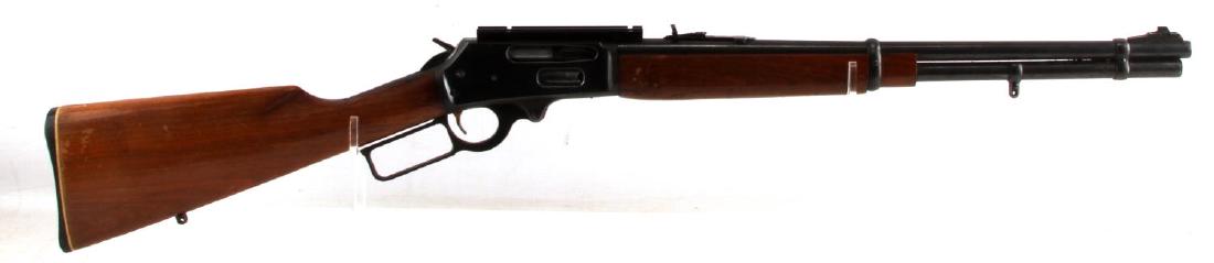 MARLIN FIREARMS MODEL 336 30-30 LEVER ACTION RIFLE: Marlin Firearms Model 336 .30-30 lever action rifle. Has a scope rail attached to the top of the rifle. In good condition. Some scuffing to the wood of the stock. Minor surface corrosion. Caliber: .30