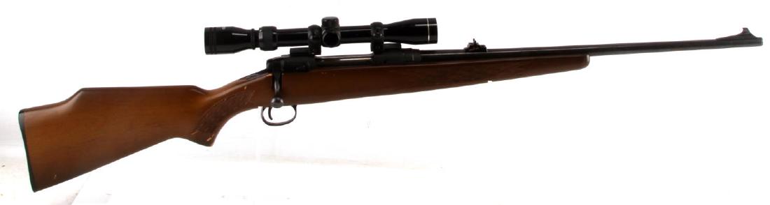 SAVAGE ARMS 110E .243 CAL BOLT ACTION RIFLE SCOPE: Savage Model 110E in .243 Win. caliber with 3-9X32 Tasso scope. Checkered wood stock, blued steel 23 inch barrel with fair bore, incline front sight and Williams dovetail rear sight. Little oxidation 