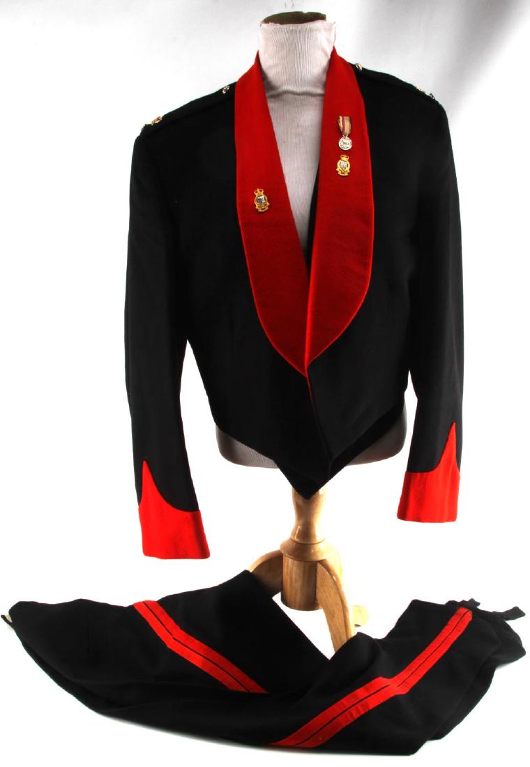 ROYAL CANADIAN WWII ERA DRESS TUNIC PANTS & VEST: Royal Canadian WWII era tunic, vest, & pants. Front displays notable WWII Defense medal. Left and right shoulders show matching crown pins. All in VG condition.