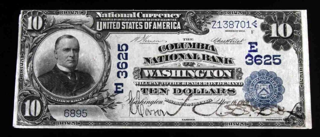 1902 WASHINGTON DC $10 NATIONAL CURRENCY BANKNOTE: From The Columbia National Bank of Washington. Almost Uncirculated condition. One pinhole, and the top left corner is torn. Paper is crisp and colors are bright. Vernon-Treat signatures. S/N 6895. FR 