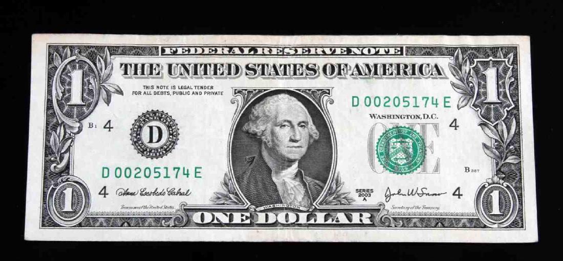 SMALL FEDERAL RESERVE $1 REVERSE OVERPRINT ERROR: A 2003 series $1 bill with an overprint error on the reverse of the bill. The right side of the back has approximately 1 inch of overprint of the front design. Bill is in extra fine condition. Cabal-S