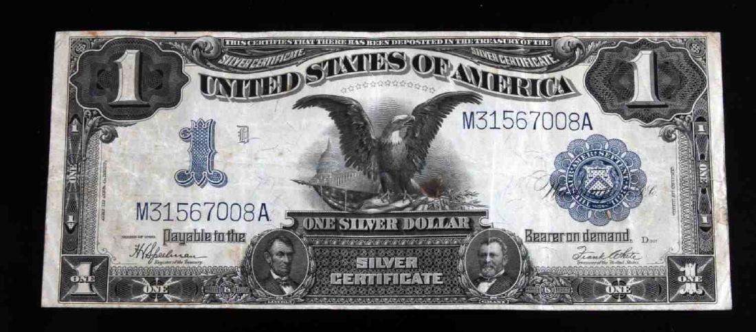1899 $1 SILVER CERTIFICATE LARGE SIZE BLACK EAGLE: Fine condition. No tears or pinholes. Some creasing. Minor discoloration, most notably near the eagle's left talon. Paper is reasonably crisp and colors remain bright. Speelman-White signatures. S/N M