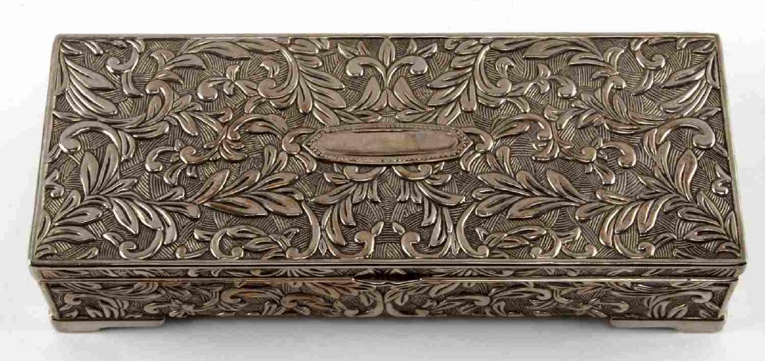 VINTAGE GODINGER EMBOSSED SILVER JEWELRY BOX: In very good condition. Leaf and vine motif, mirror intact measuring 9x2x3.5 inches.