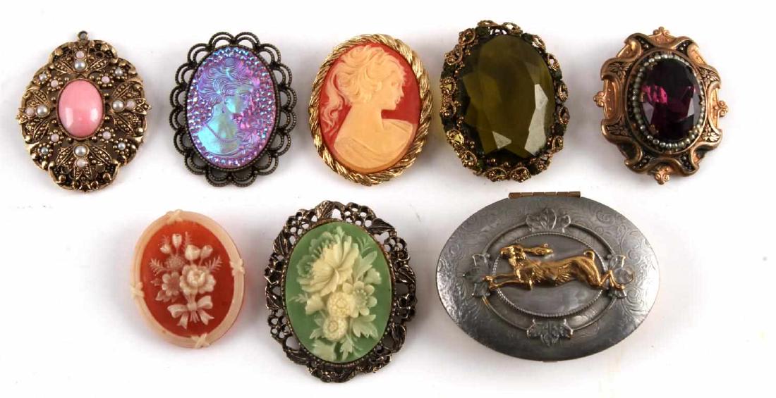 VINTAGE SILVER MARCASITE COSTUME BROOCH PENDANT: Lot includes: 3 silver marcasite pendants, 2 silver gemstone pendants, 6 vintage brooches, a vintage jewelry box (2.5 by 2 inches) and one 1970's Avon pendant.