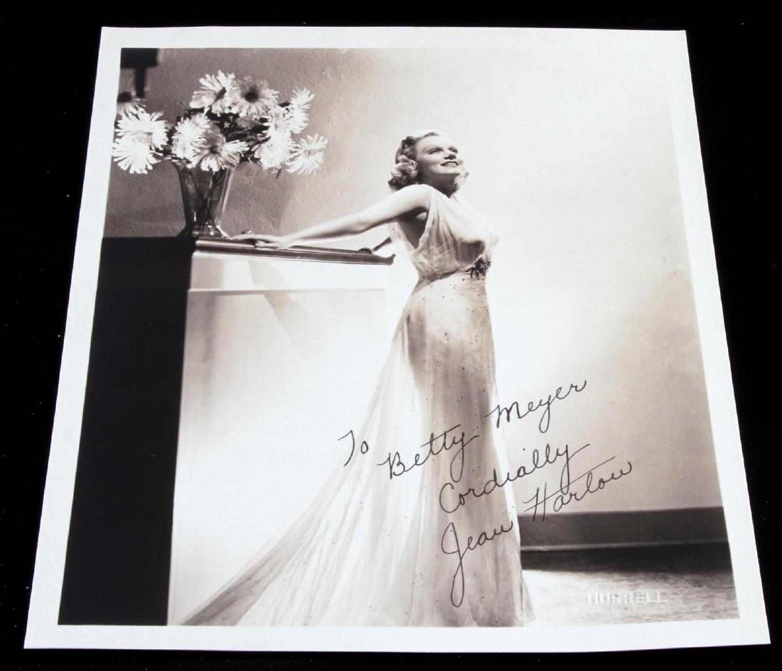 SEX SYMBOL & ACTRESS JEAN HARLOW AUTOGRAPHED PHOTO: Actress Jean Harlow autographed photo. Measures 10" x 8". VG condition. Reads "To Betty Meyer Cordially Jean Harlow".